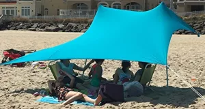 eZthings UV Light Sun Shade Protection Beach Shelters - Lightweight Tent Canopy with Sandbag Anchors