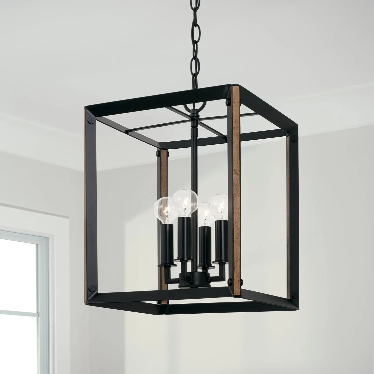 Four Light Foyer Pendant from the Rowe Collection in Matte Black and Brown Wood Finish by Capital Lighting